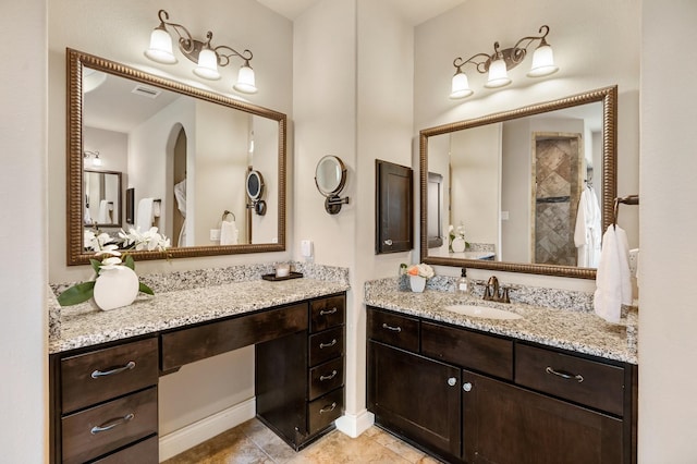 40377 Mostyn Dr, Magnolia, TX 77354 - full bath with two vanities and tile patterned flooring