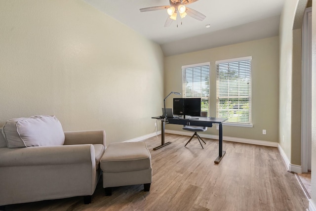 40377 Mostyn Dr, Magnolia, TX 77354 - home office featuring light wood-style floors, baseboards, a ceiling fan, and vaulted ceiling