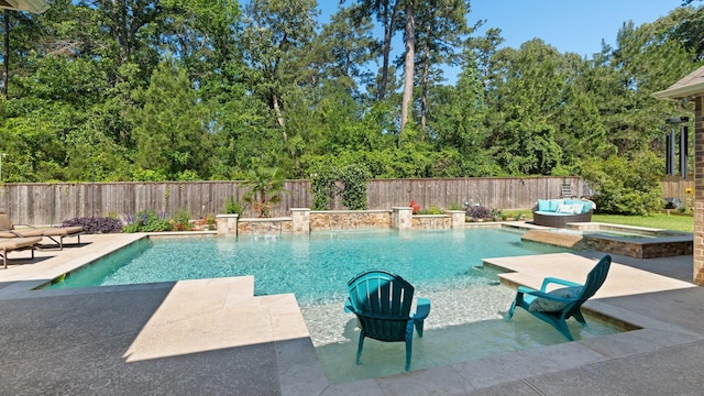 40377 Mostyn Dr, Magnolia, TX 77354 - view of swimming pool with an in-ground hot tub, a fenced backyard, and a patio