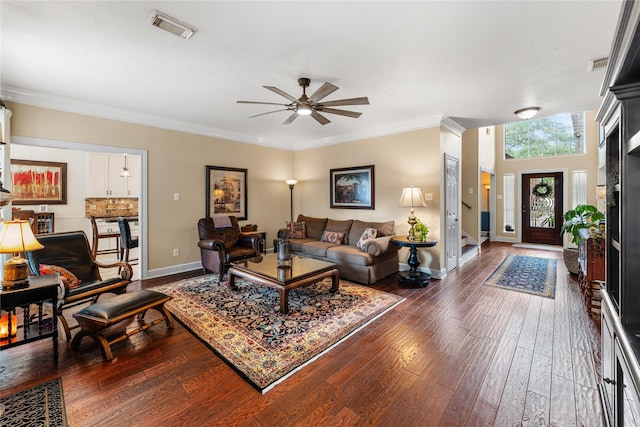 bedroom with light colored carpet, attic access, ceiling fan, baseboards, and visible vents