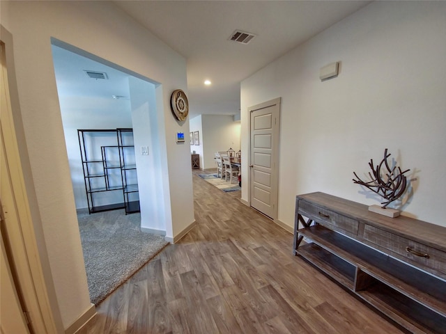 1634 William Scott St, Baytown, TX 77523 - hall featuring wood finished floors, baseboards, and recessed lighting