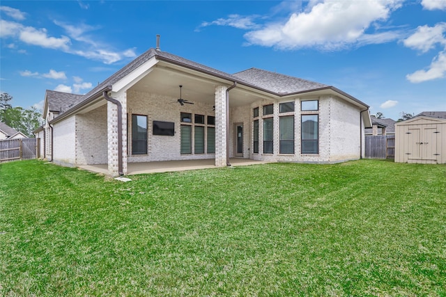 23446 Timbarra Glen Dr, New Caney, TX 77357 - back of house featuring a patio area, a shed, ceiling fan, brick siding, and a fenced backyard