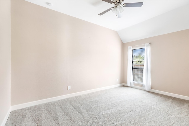 23446 Timbarra Glen Dr, New Caney, TX 77357 - empty room with lofted ceiling, ceiling fan, light colored carpet, and baseboards