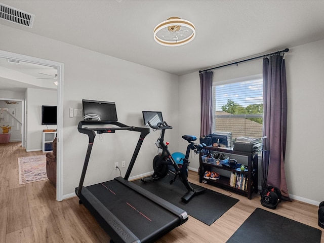 1800 Bright Way Ln, Dickinson, TX 77539 - workout room with wood finished floors, baseboards, and ceiling fan