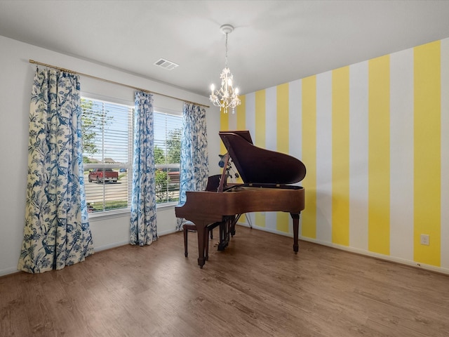1800 Bright Way Ln, Dickinson, TX 77539 - living area with a chandelier, wood finished floors, wallpapered walls, and baseboards