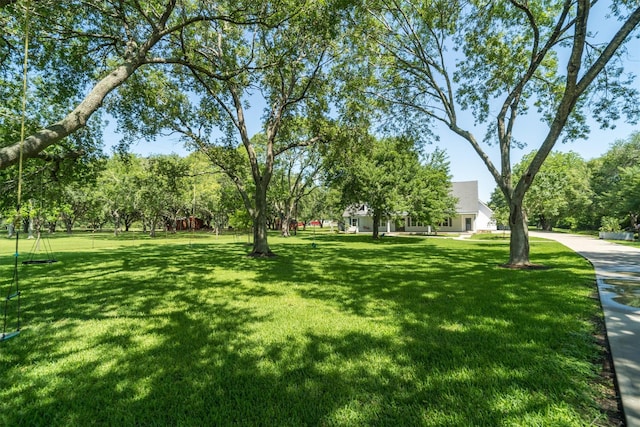 2350 Hewitt St, League City, TX 77573 - view of community featuring a yard