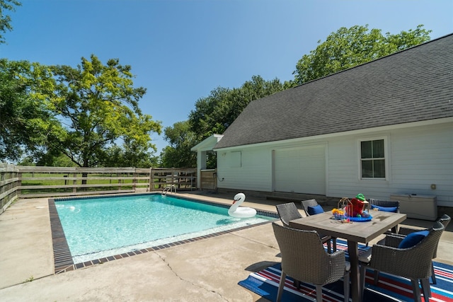 2350 Hewitt St, League City, TX 77573 - view of swimming pool with a patio, fence, and outdoor dining area