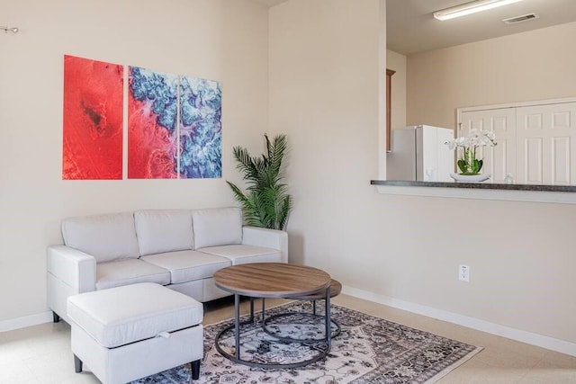 4210 Church St, Galveston, TX 77550 - living area featuring visible vents and baseboards