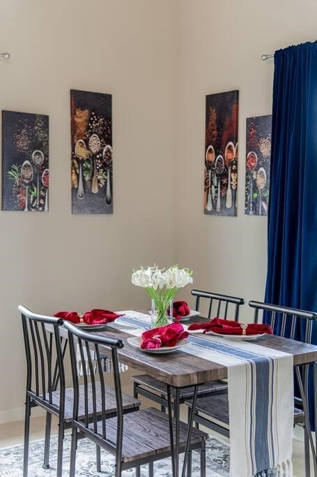 4210 Church St, Galveston, TX 77550 - dining room featuring baseboards