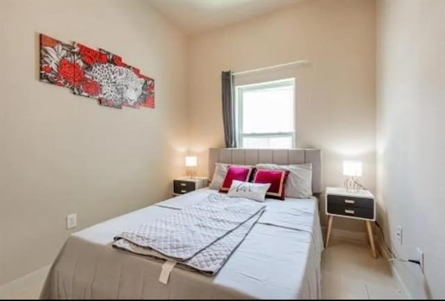 4210 Church St, Galveston, TX 77550 - bedroom featuring baseboards