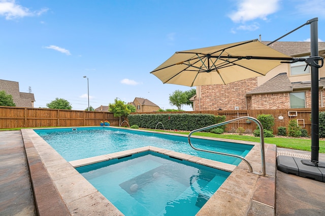 11710 Saporito Way, Richmond, TX 77406 - view of swimming pool featuring a fenced backyard, a fenced in pool, an in ground hot tub, and a patio area