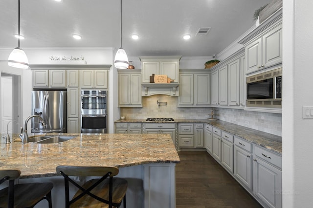 11710 Saporito Way, Richmond, TX 77406 - kitchen with crown molding, dark wood-type flooring, visible vents, stainless steel appliances, and a sink