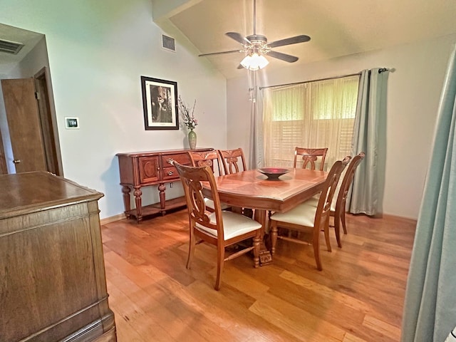 408 Redbud Rdg, Onalaska, TX 77360 - dining area with visible vents, a ceiling fan, light wood-style floors, and vaulted ceiling
