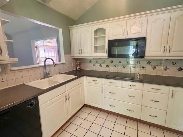 408 Redbud Rdg, Onalaska, TX 77360 - kitchen with black appliances, dark countertops, lofted ceiling, and a sink