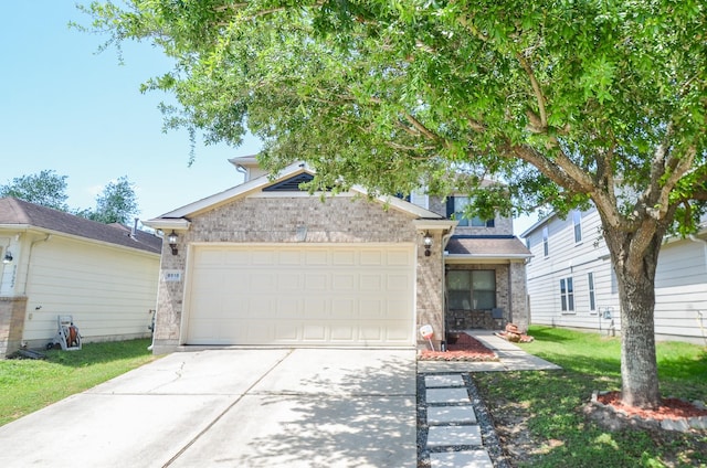 9518 Prairie Dale Ct, Houston, TX 77075 - view of front of property featuring brick siding, driveway, a garage, and a front yard