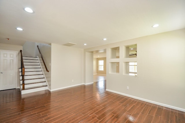 9518 Prairie Dale Ct, Houston, TX 77075 - unfurnished living room featuring wood finished floors, baseboards, recessed lighting, and stairway