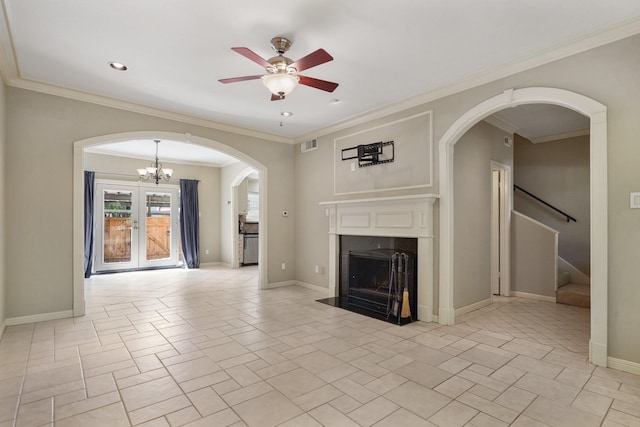 11711 Memorial Dr Unit 367, Houston, TX 77024 - unfurnished living room with visible vents, baseboards, a fireplace, and ceiling fan with notable chandelier