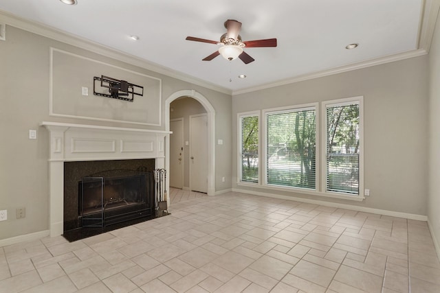 11711 Memorial Dr Unit 367, Houston, TX 77024 - unfurnished living room featuring baseboards, arched walkways, ceiling fan, a fireplace, and crown molding