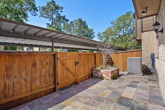 11711 Memorial Dr Unit 367, Houston, TX 77024 - view of patio / terrace with fence and central air condition unit