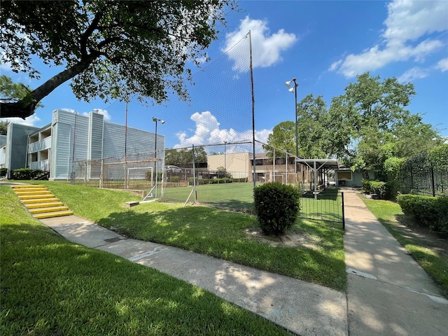 view of property's community with fence
