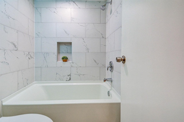 full bathroom featuring toilet and shower / bathtub combination