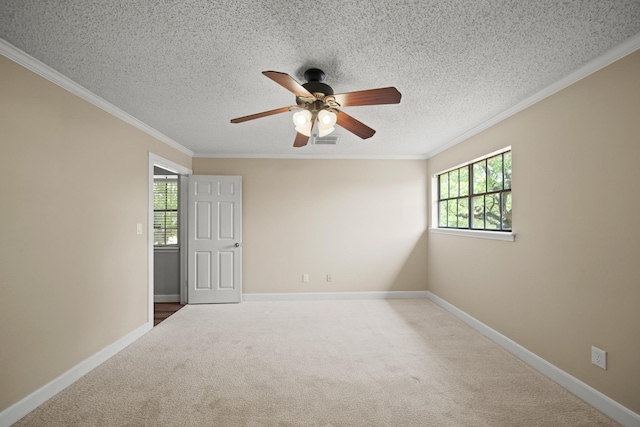 2331 Sand Ct, Richmond, TX 77406 - carpeted spare room featuring visible vents, baseboards, ornamental molding, a ceiling fan, and a textured ceiling