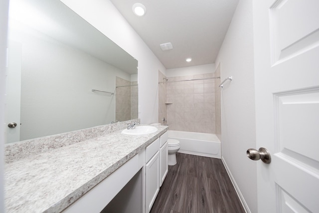 16547 Willow Forest Dr, Conroe, TX 77302 - full bath featuring vanity, wood finished floors, shower / bathtub combination, and recessed lighting