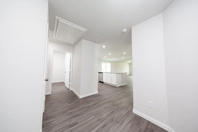 16547 Willow Forest Dr, Conroe, TX 77302 - hall with attic access, wood finished floors, and recessed lighting