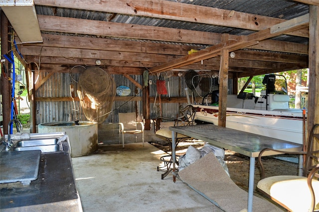 view of patio / terrace with an exterior structure and a sink