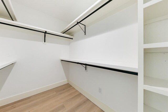 5338 Pease St, Houston, TX 77023 - walk in closet featuring light wood-type flooring