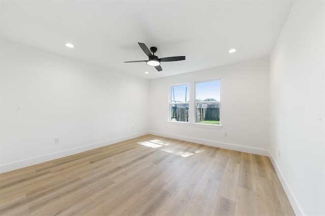5338 Pease St, Houston, TX 77023 - empty room with recessed lighting, light wood finished floors, baseboards, and ceiling fan