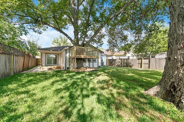 5338 Pease St, Houston, TX 77023 - rear view of house featuring a yard and a fenced backyard