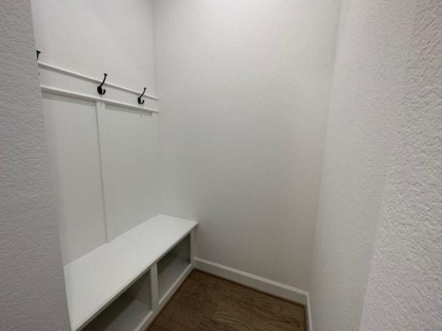9015 Orchard Cv, Missouri City, TX 77459 - mudroom with a textured wall and baseboards