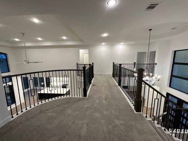 9015 Orchard Cv, Missouri City, TX 77459 - hall featuring recessed lighting, an upstairs landing, visible vents, and baseboards