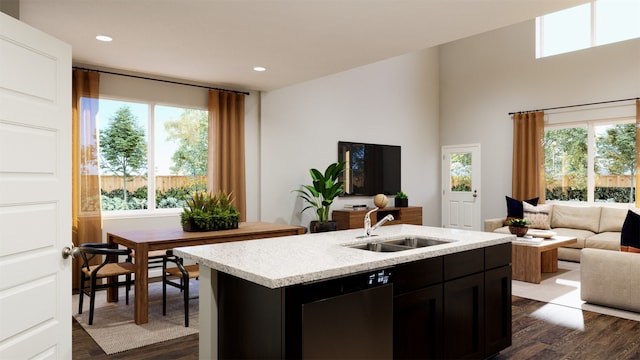 16543 Willow Forest Dr, Conroe, TX 77302 - kitchen featuring a wealth of natural light, dishwasher, a sink, dark wood-style flooring, and open floor plan