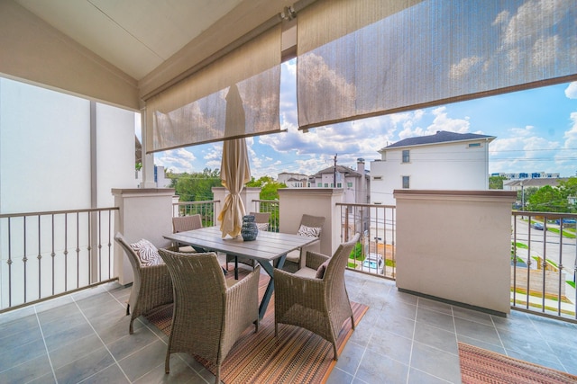 balcony featuring outdoor dining space