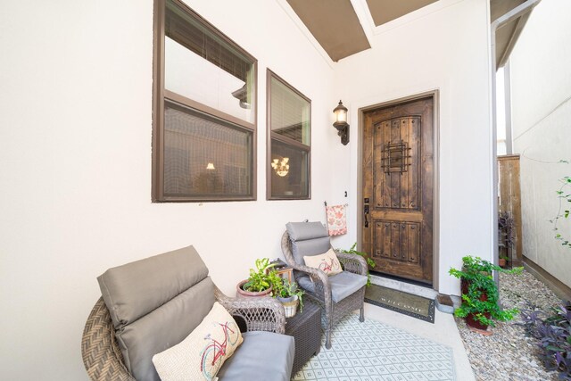 property entrance featuring stucco siding