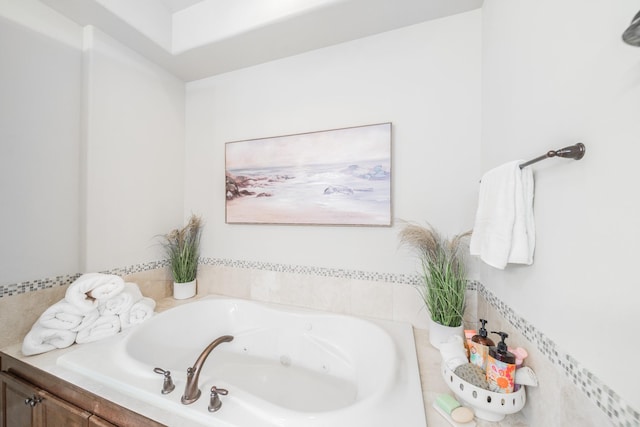 full bathroom with a whirlpool tub