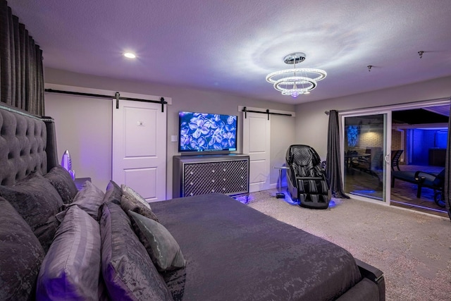 bedroom with a notable chandelier, recessed lighting, carpet floors, a barn door, and access to exterior