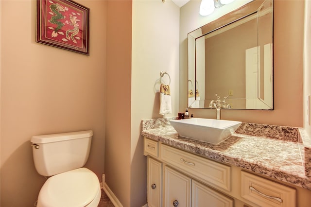 16123 Chasemore Dr, Spring, TX 77379 - bathroom with vanity, toilet, and baseboards
