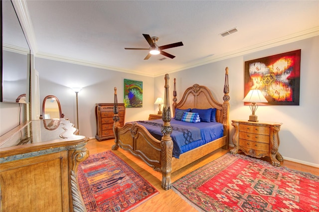 16123 Chasemore Dr, Spring, TX 77379 - bedroom featuring wood finished floors, ornamental molding, and a ceiling fan