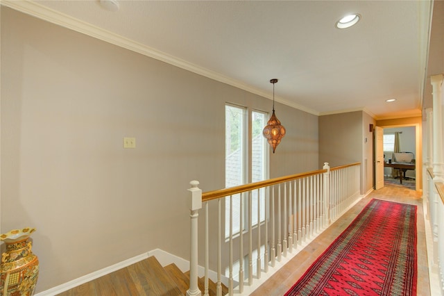 16123 Chasemore Dr, Spring, TX 77379 - hallway with an upstairs landing, wood finished floors, crown molding, baseboards, and recessed lighting