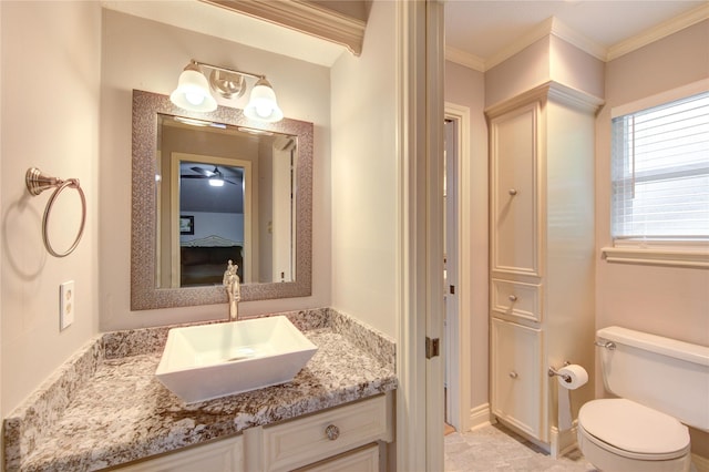 16123 Chasemore Dr, Spring, TX 77379 - bathroom with vanity, toilet, and crown molding