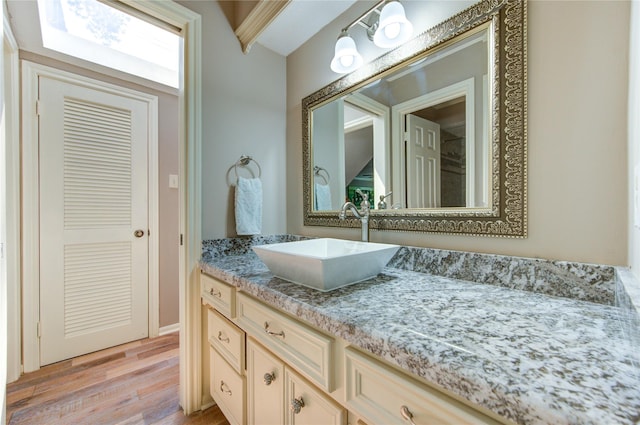16123 Chasemore Dr, Spring, TX 77379 - bathroom featuring wood finished floors and vanity