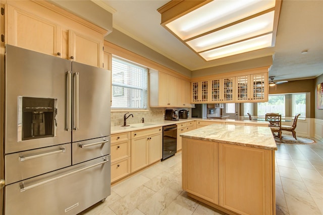 16123 Chasemore Dr, Spring, TX 77379 - kitchen featuring high end refrigerator, light brown cabinetry, black dishwasher, a center island, and ornamental molding