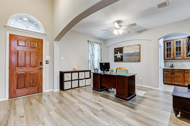 2011 Wembley Way, Rosenberg, TX 77471 - office area with arched walkways, plenty of natural light, a ceiling fan, and visible vents