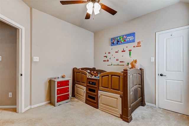 2011 Wembley Way, Rosenberg, TX 77471 - bedroom featuring baseboards, light carpet, and a ceiling fan