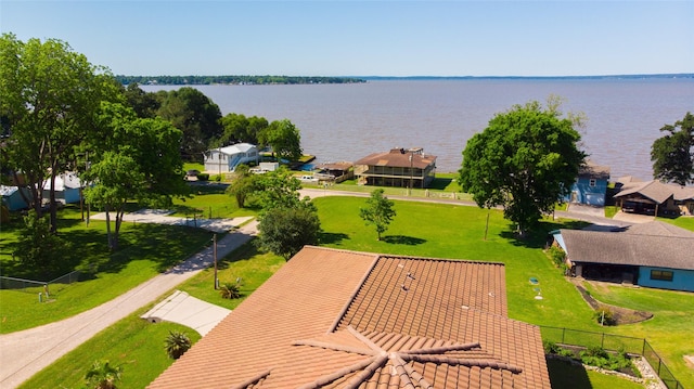 aerial view with a residential view and a water view