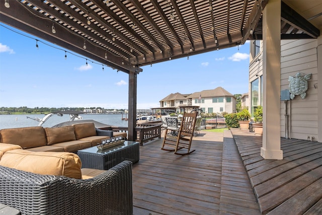 331 Old Aqua Lndg, Montgomery, TX 77356 - wooden deck with a water view, an outdoor hangout area, and a pergola