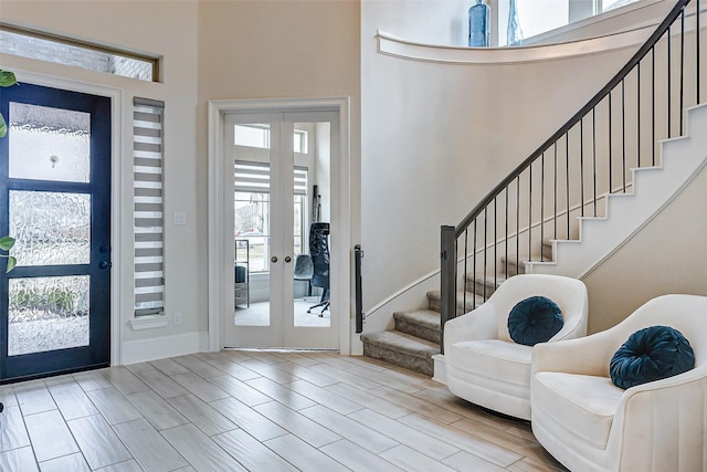 21123 Coral View Dr, Cypress, TX 77433 - foyer with french doors, stairway, and a towering ceiling